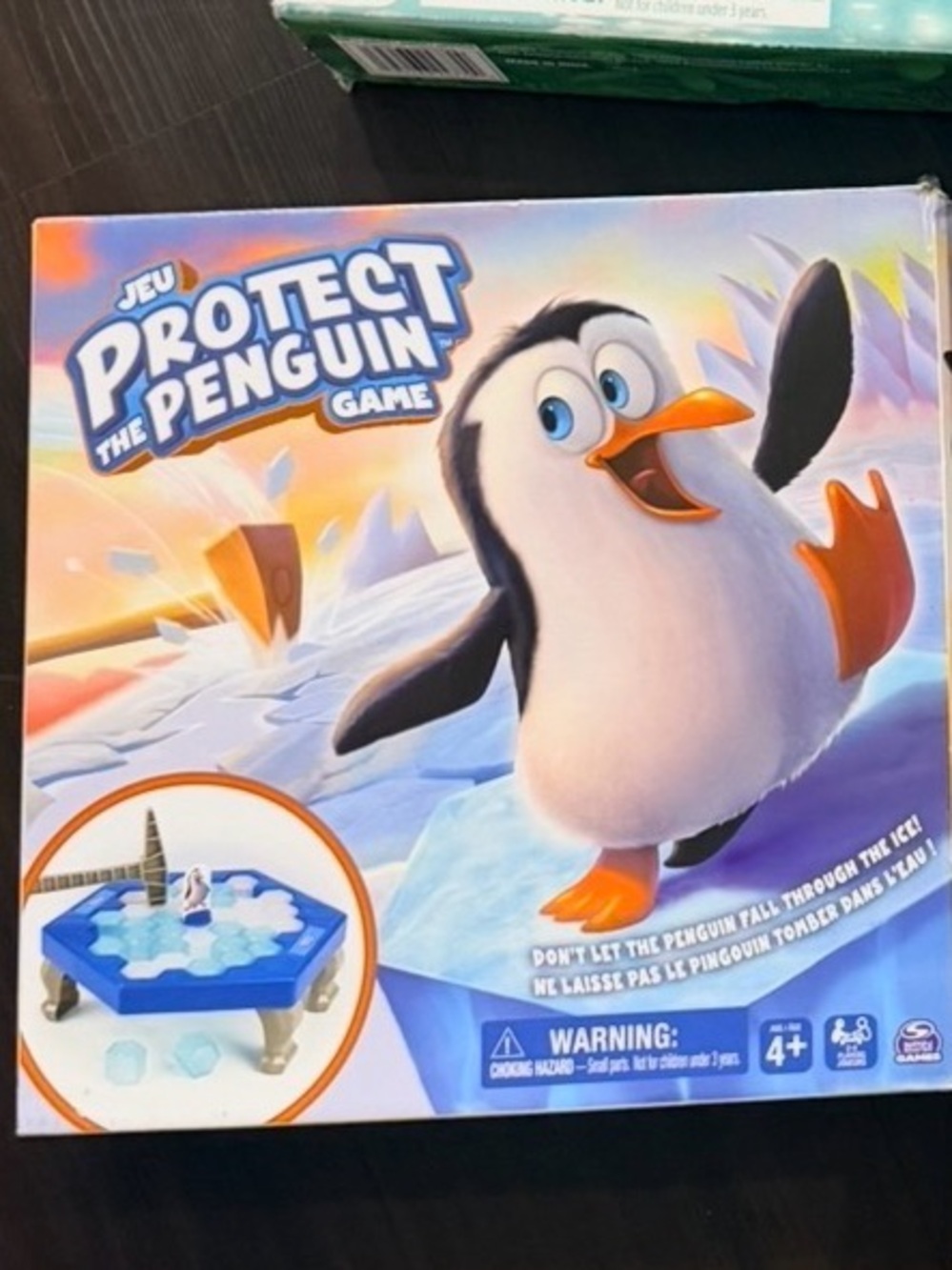 Protect the Penguin Board Game - Colorful Penguin Box Art